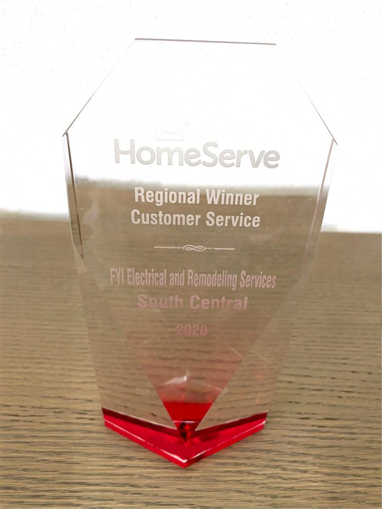 A glass trophy with the words " homeserve regional winter customer service ".